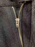 Close-up of YKK zip fly on Chipang Denim 15 oz black jeans