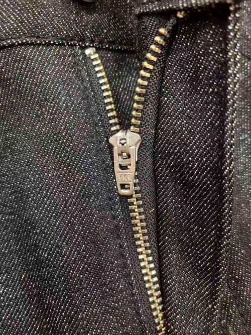 Close-up of YKK zip fly on Chipang Denim 15 oz black jeans